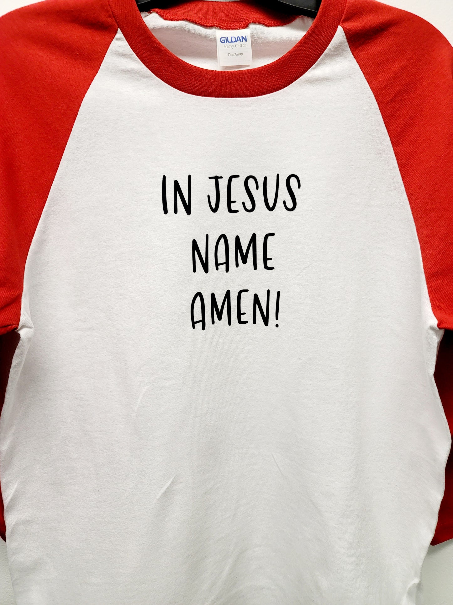 In Jesus name Amen shirt with red raglan sleeve
