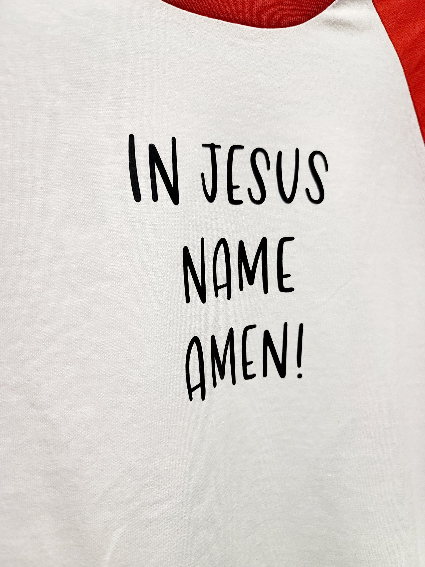 In Jesus name Amen shirt with red raglan sleeve
