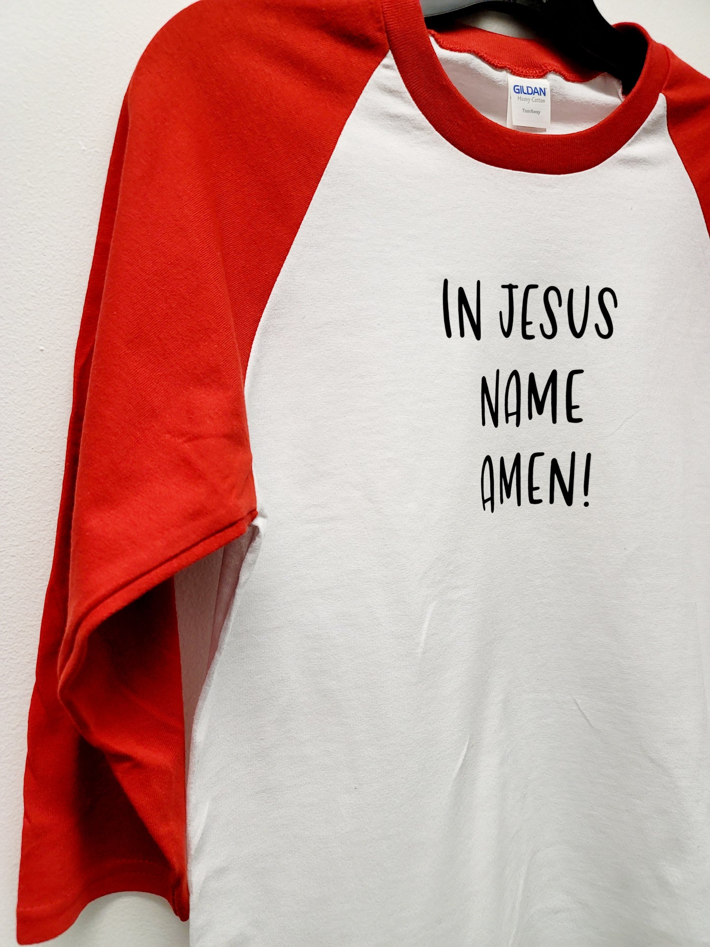 In Jesus name Amen shirt with red raglan sleeve