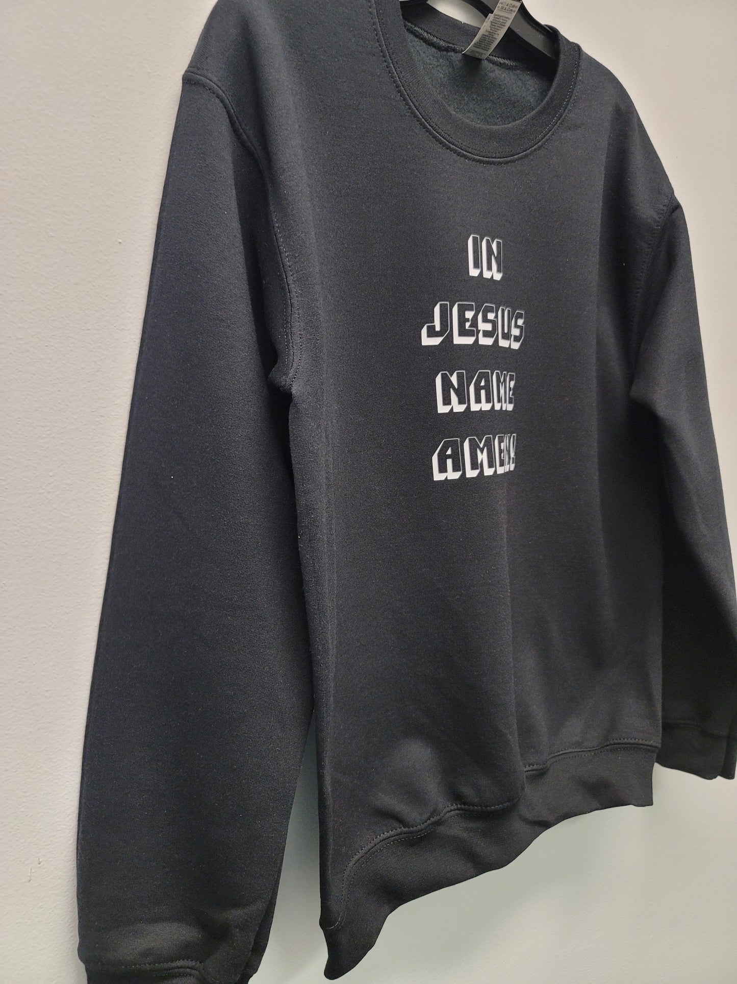 In Jesus name crew neck sweater with block letters