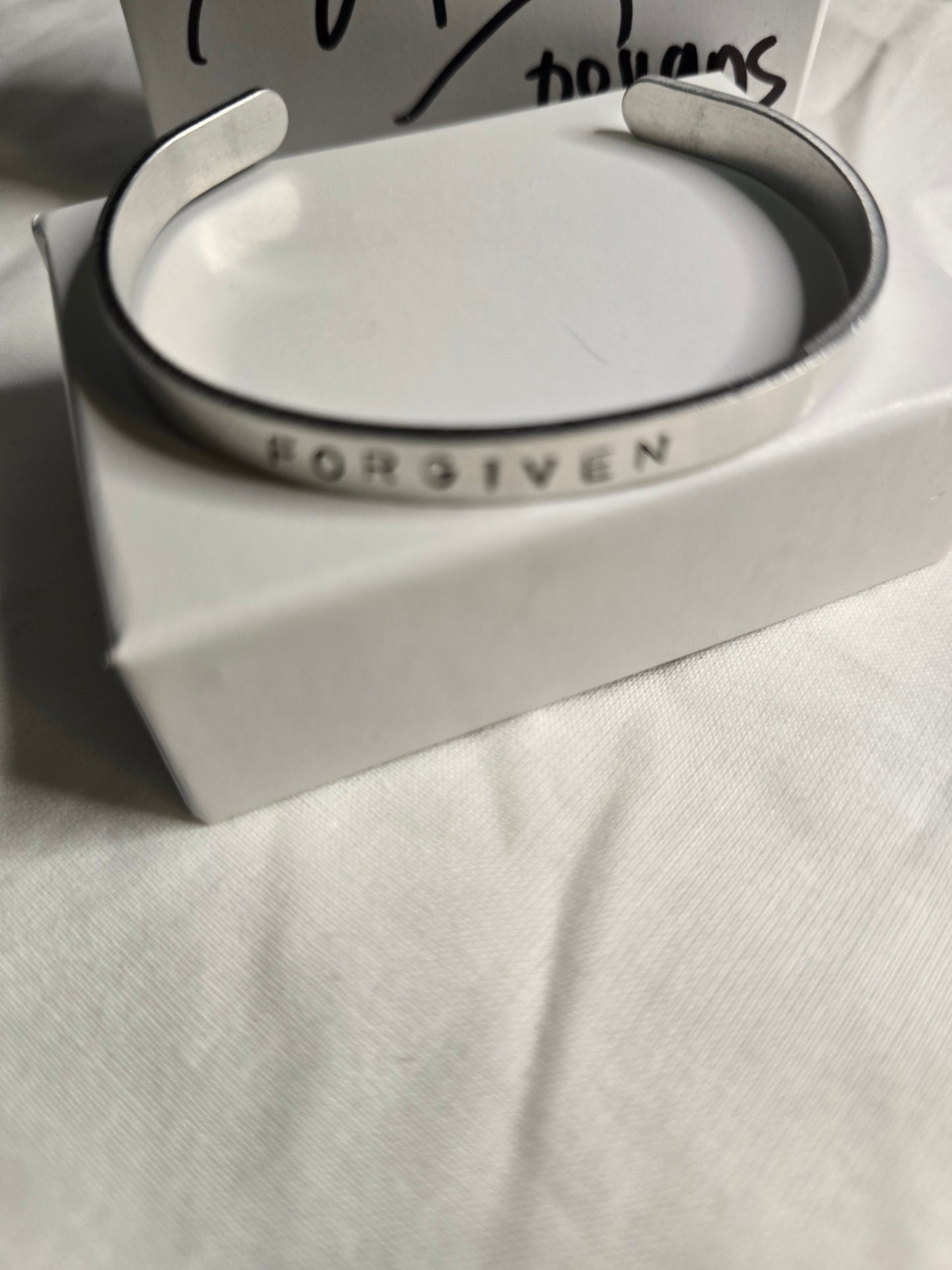 Forgiven metal bracelet