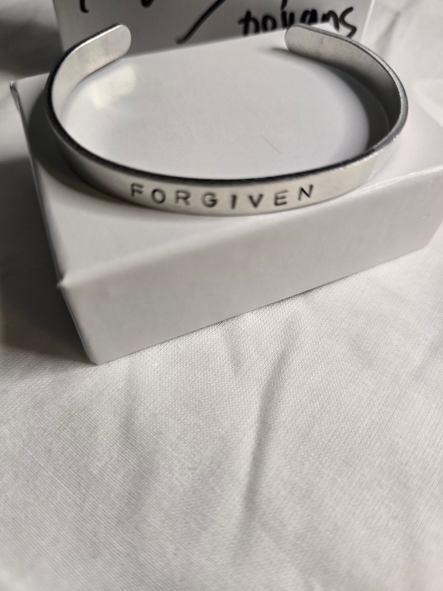 Forgiven metal bracelet