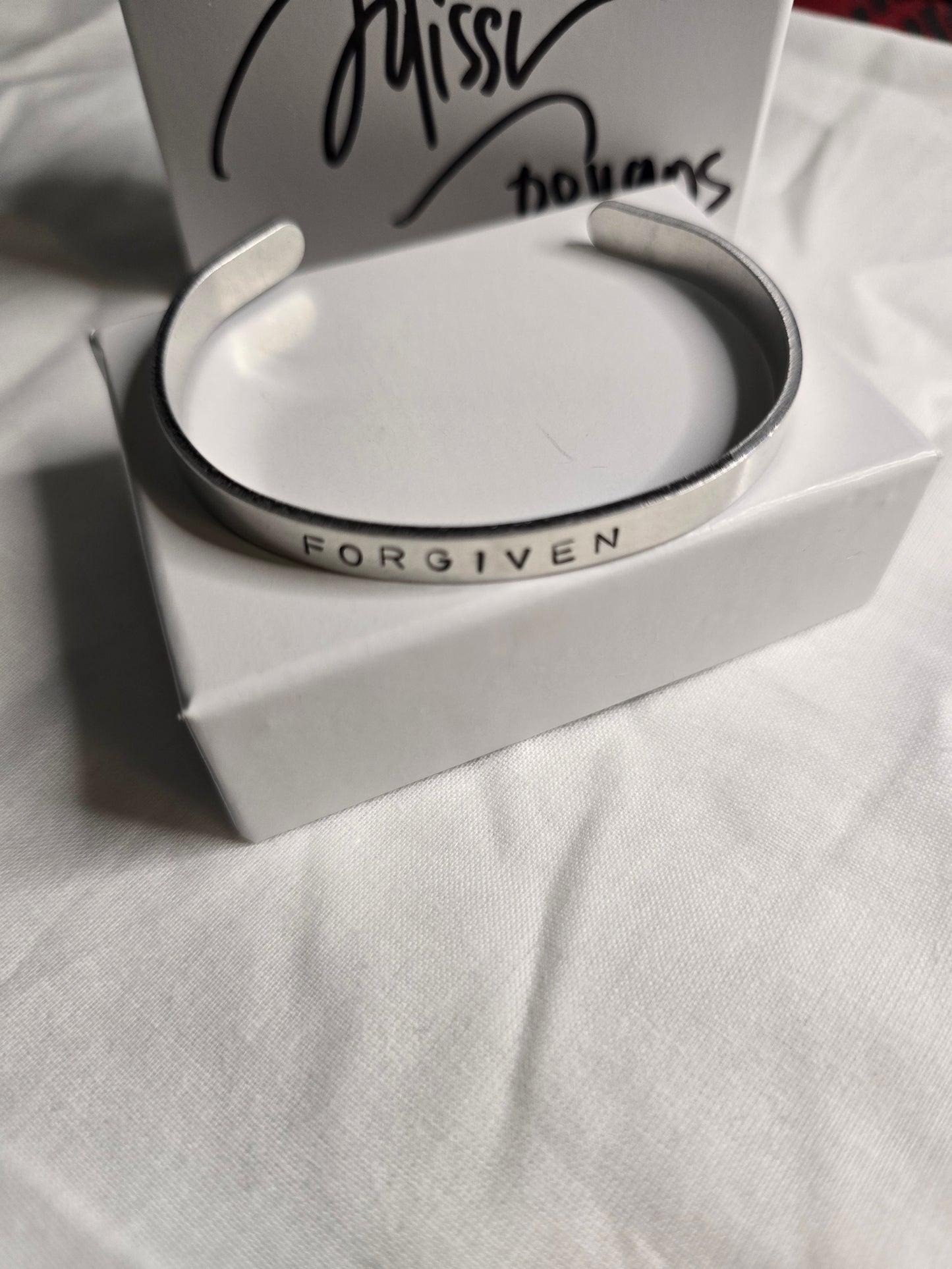 Forgiven metal bracelet