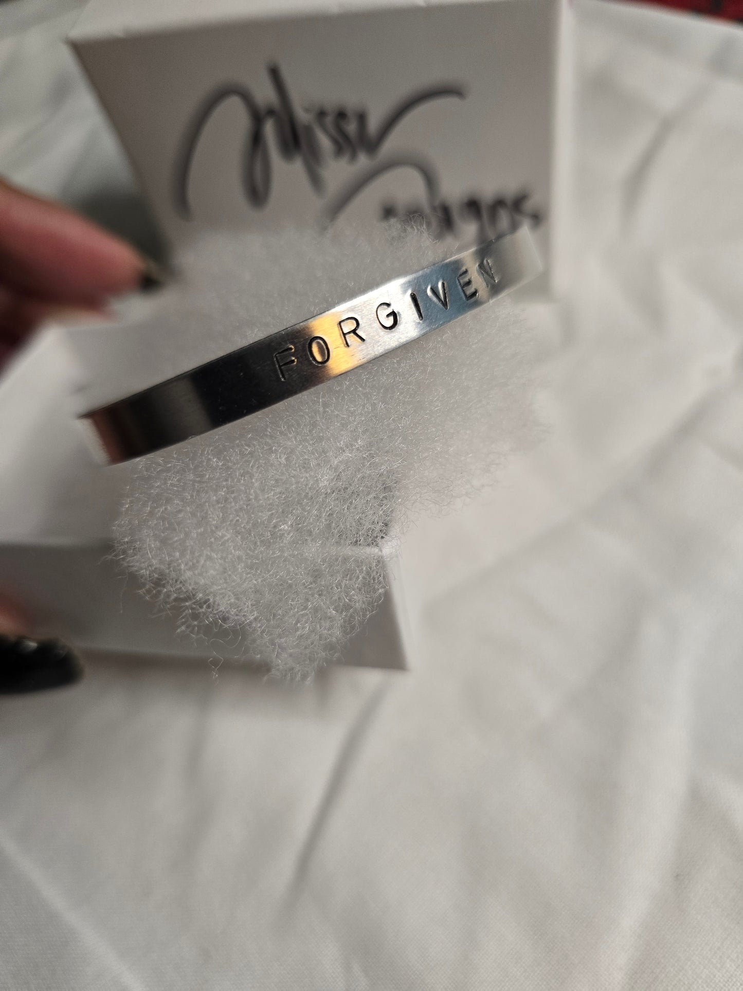 Forgiven metal bracelet