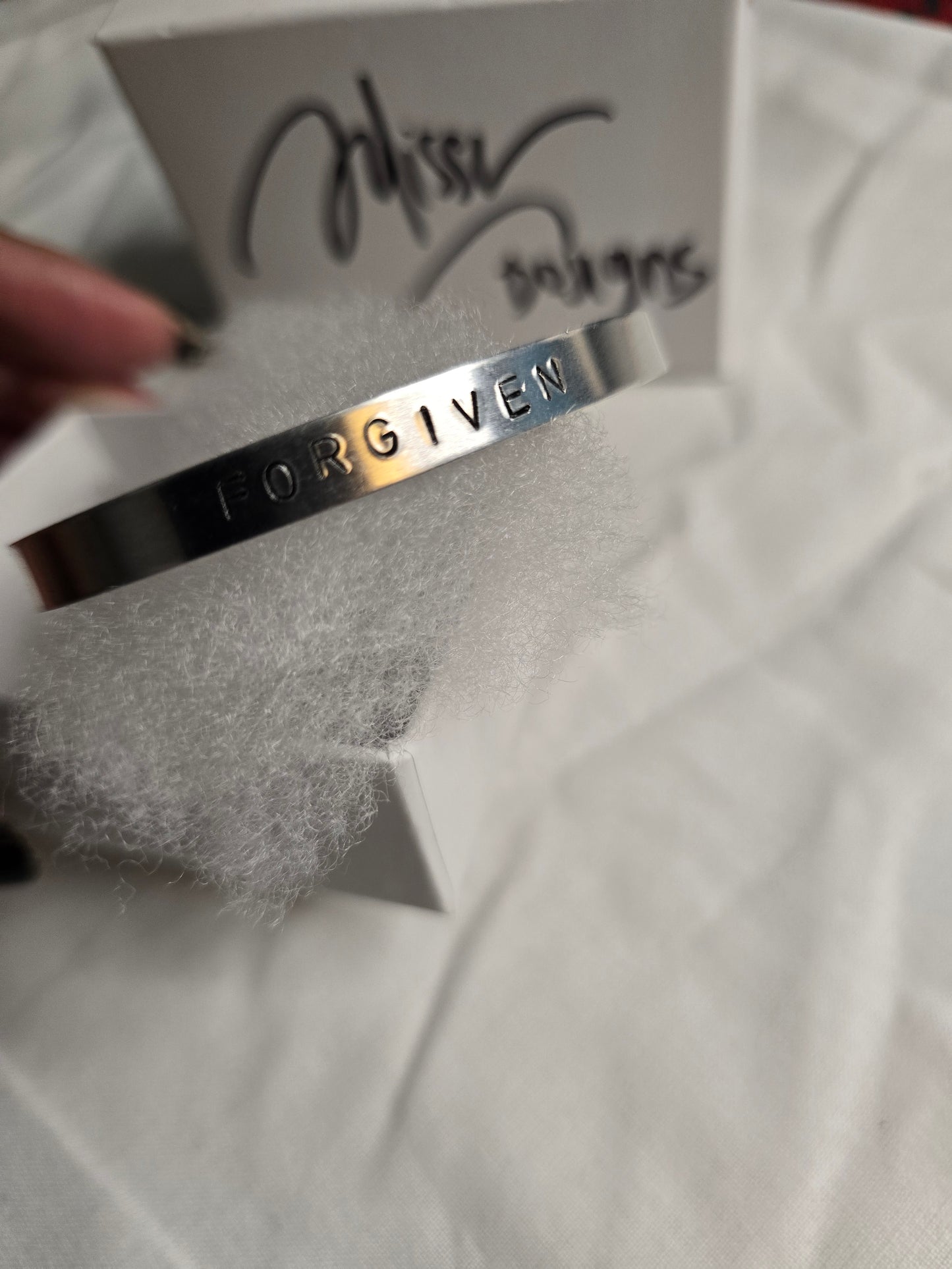 Forgiven metal bracelet