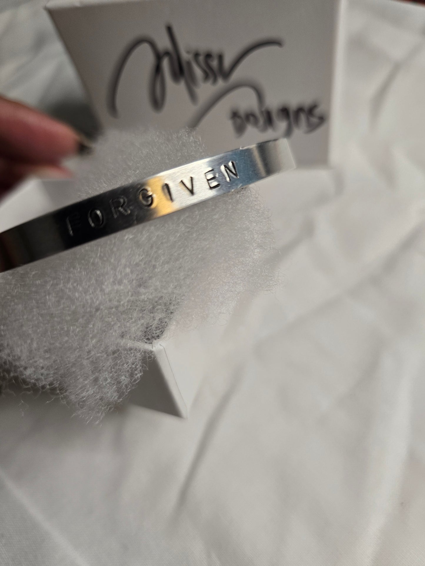 Forgiven metal bracelet