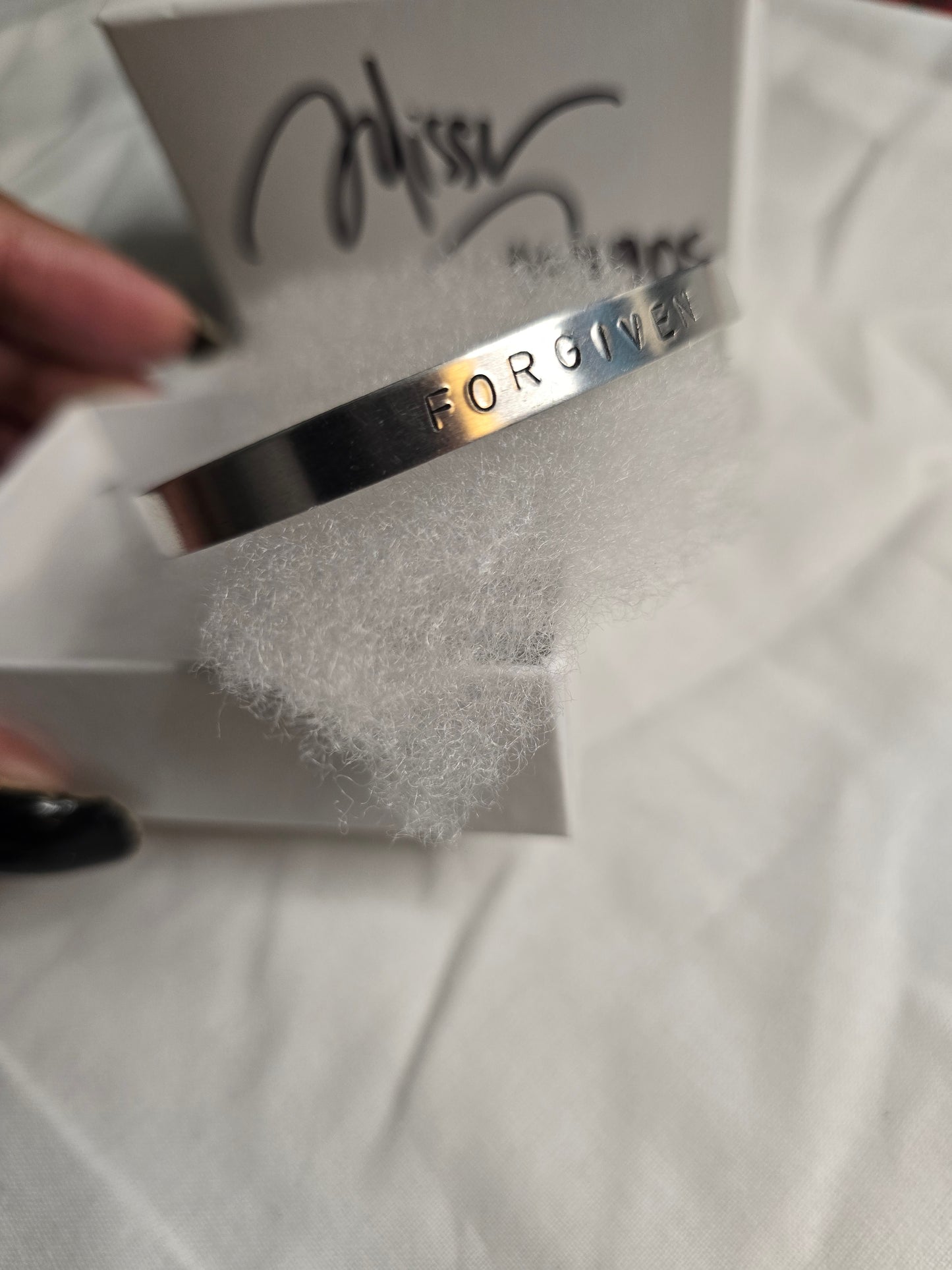 Forgiven metal bracelet