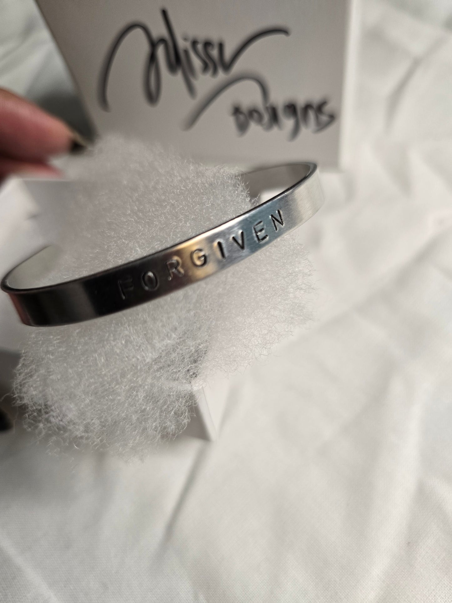 Forgiven metal bracelet