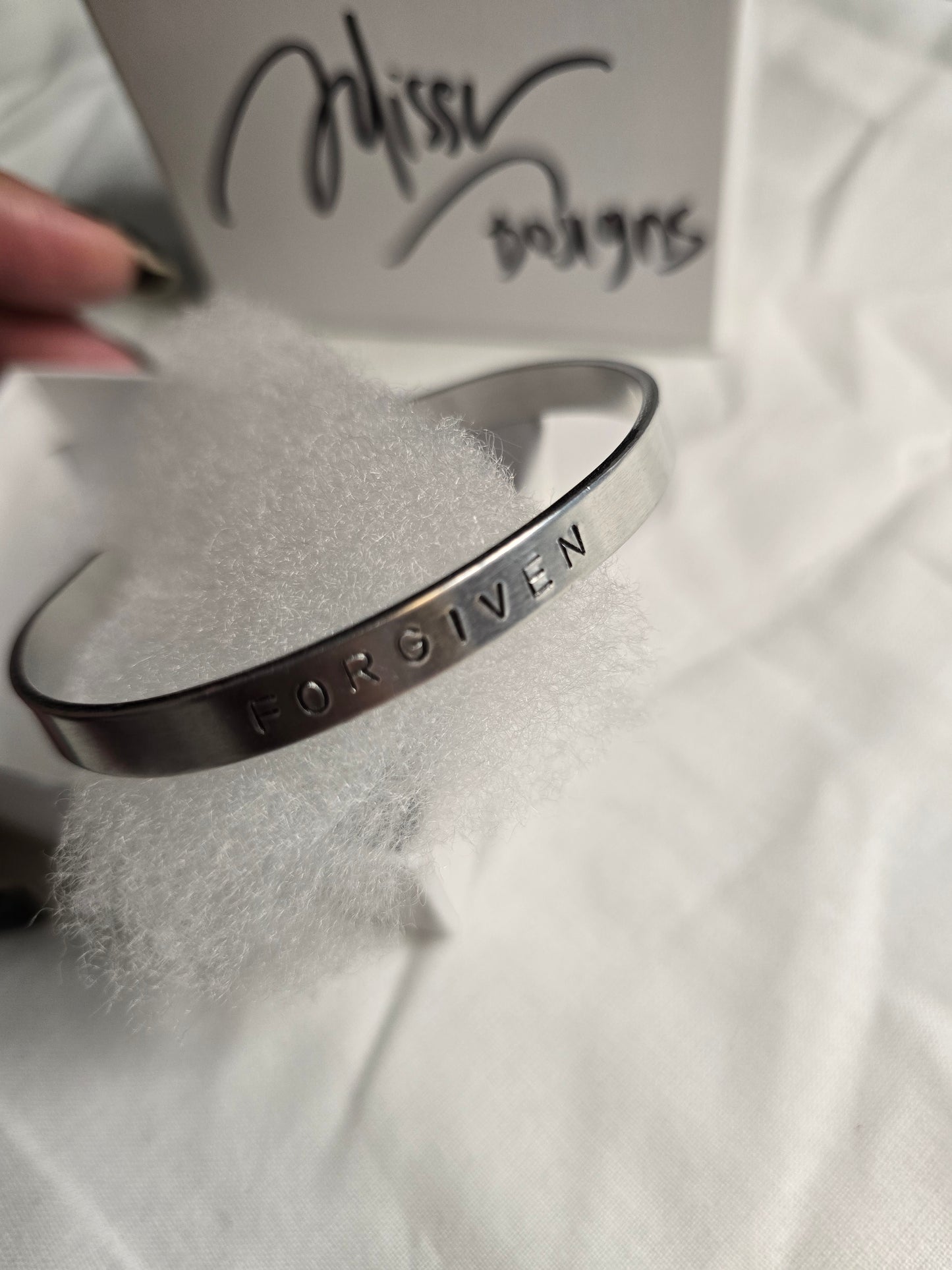 Forgiven metal bracelet