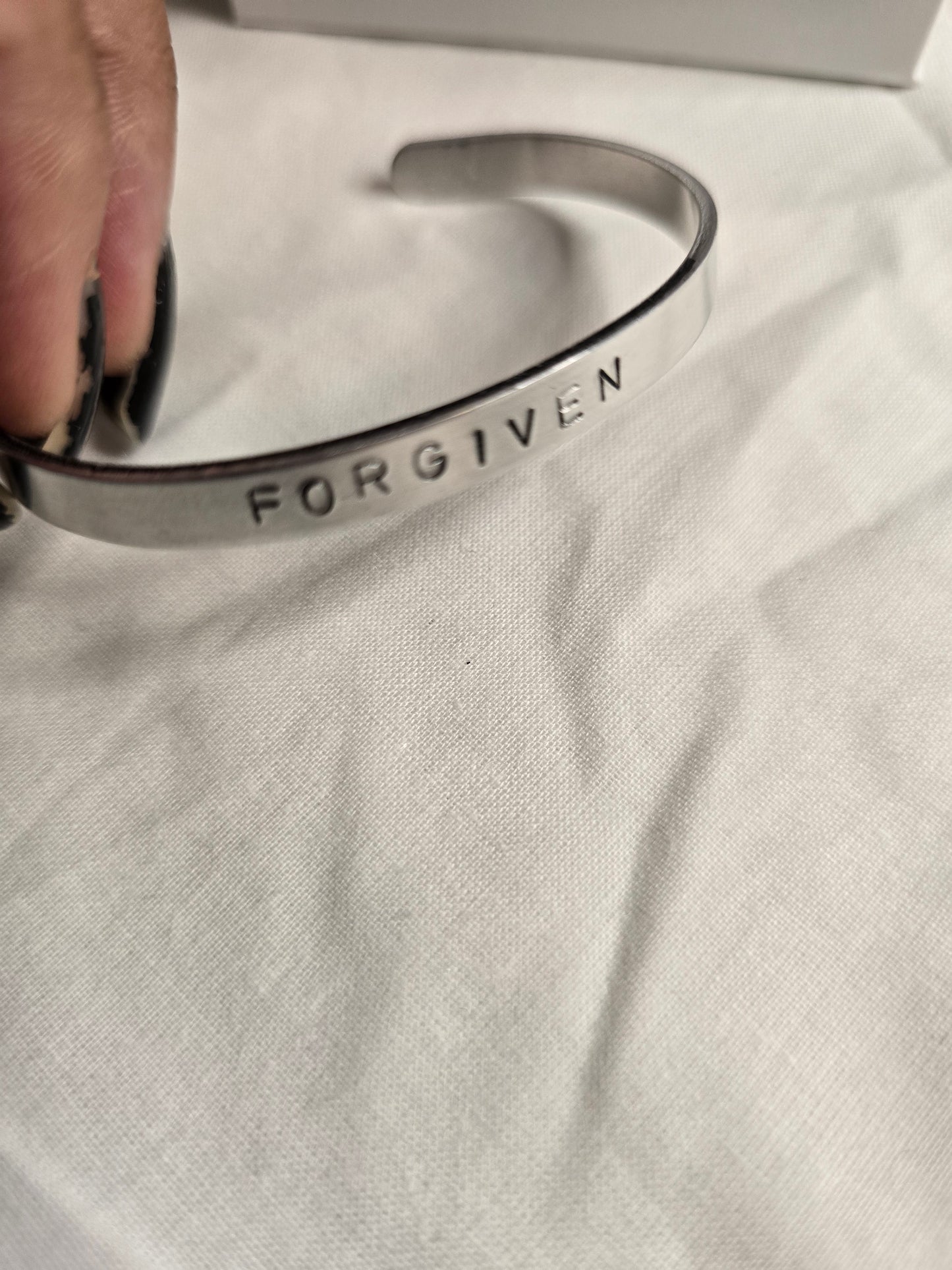 Forgiven metal bracelet