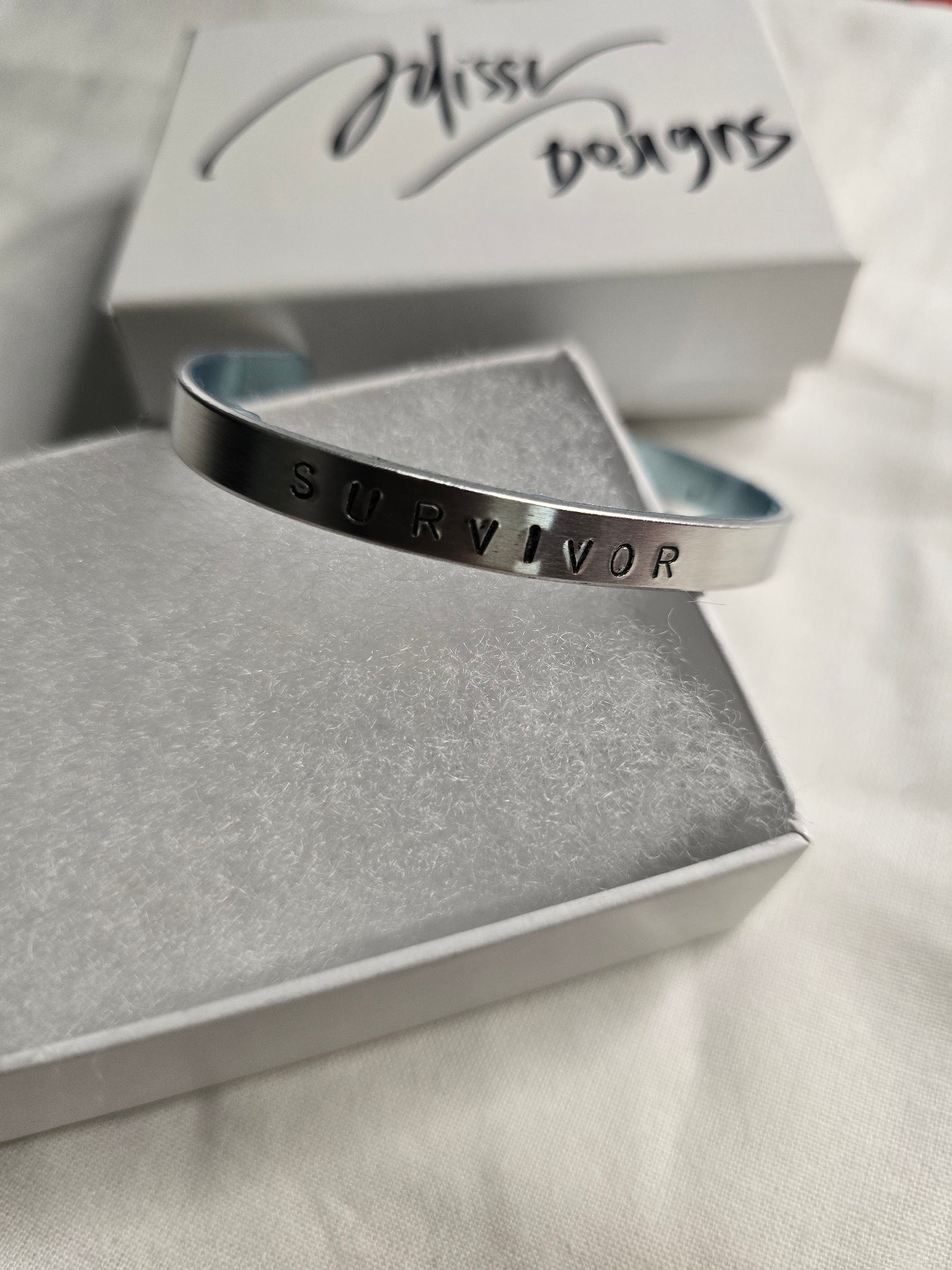 Survivor metal bracelet