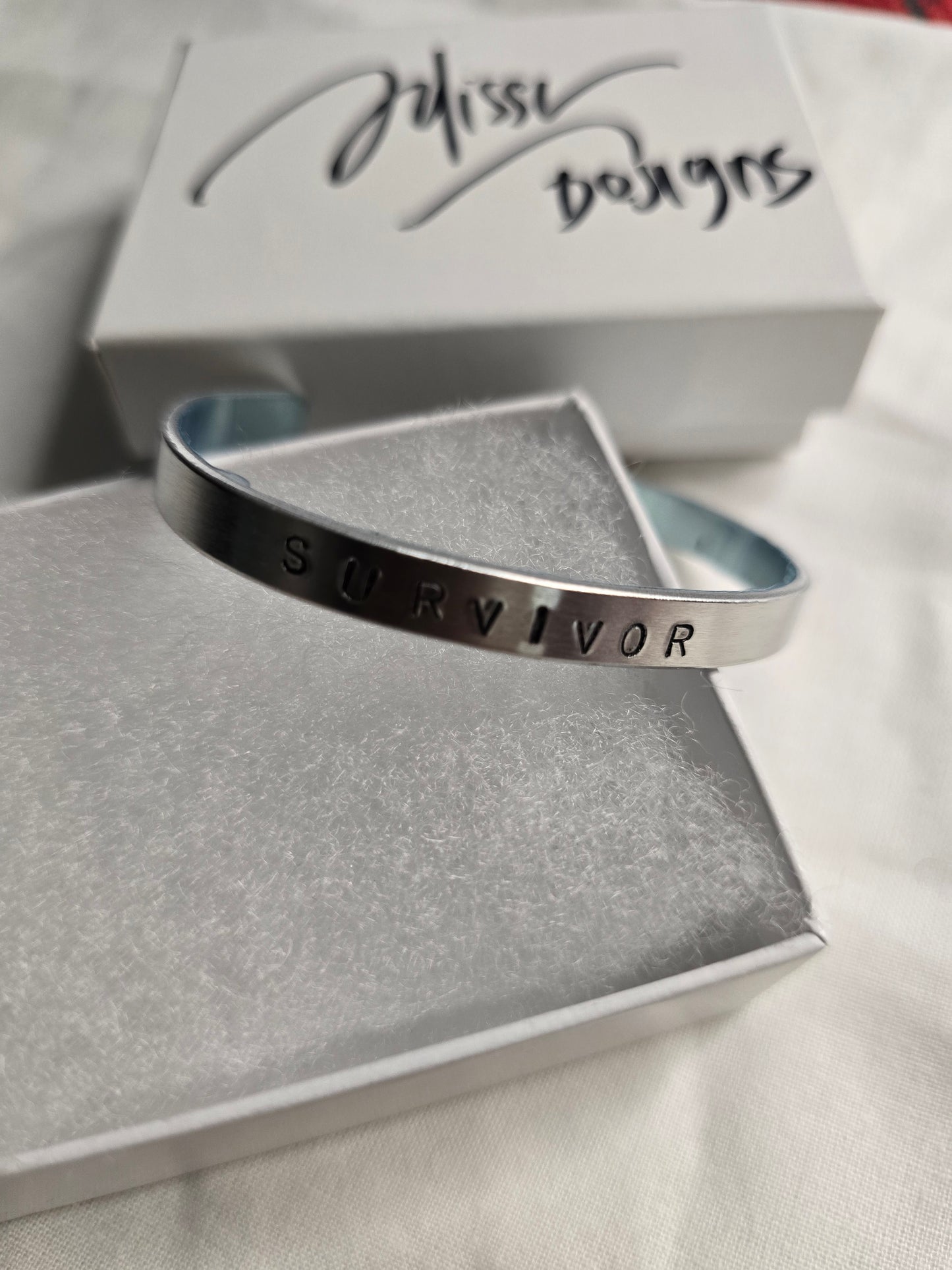 Survivor metal bracelet