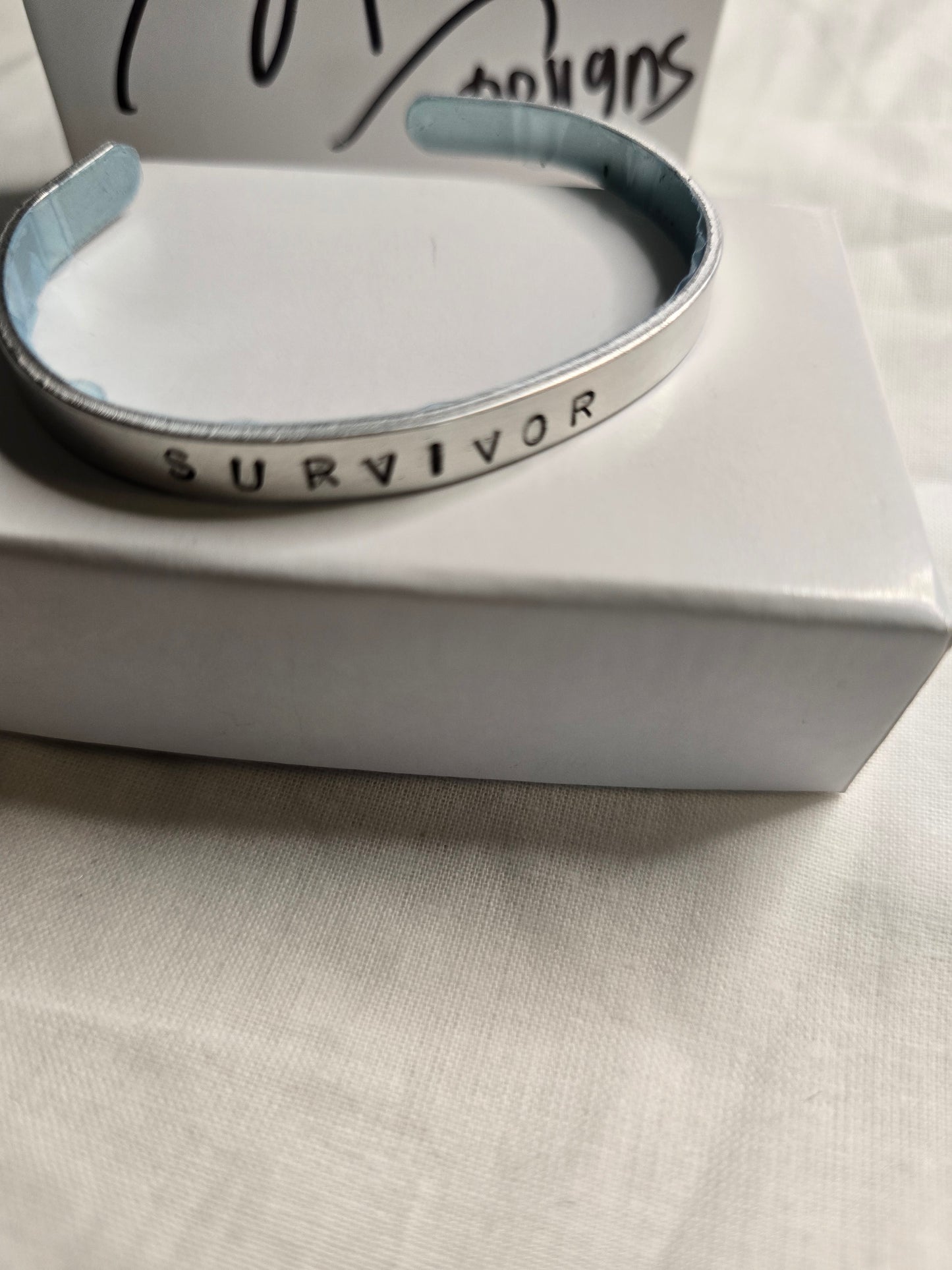 Survivor metal bracelet