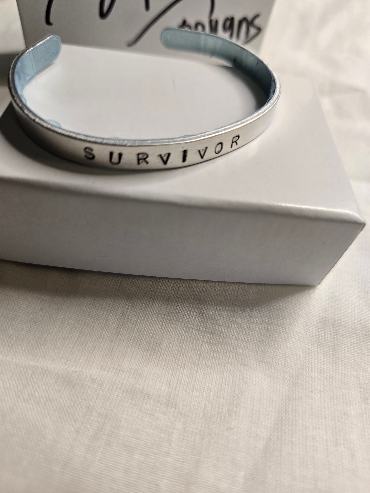 Survivor metal bracelet
