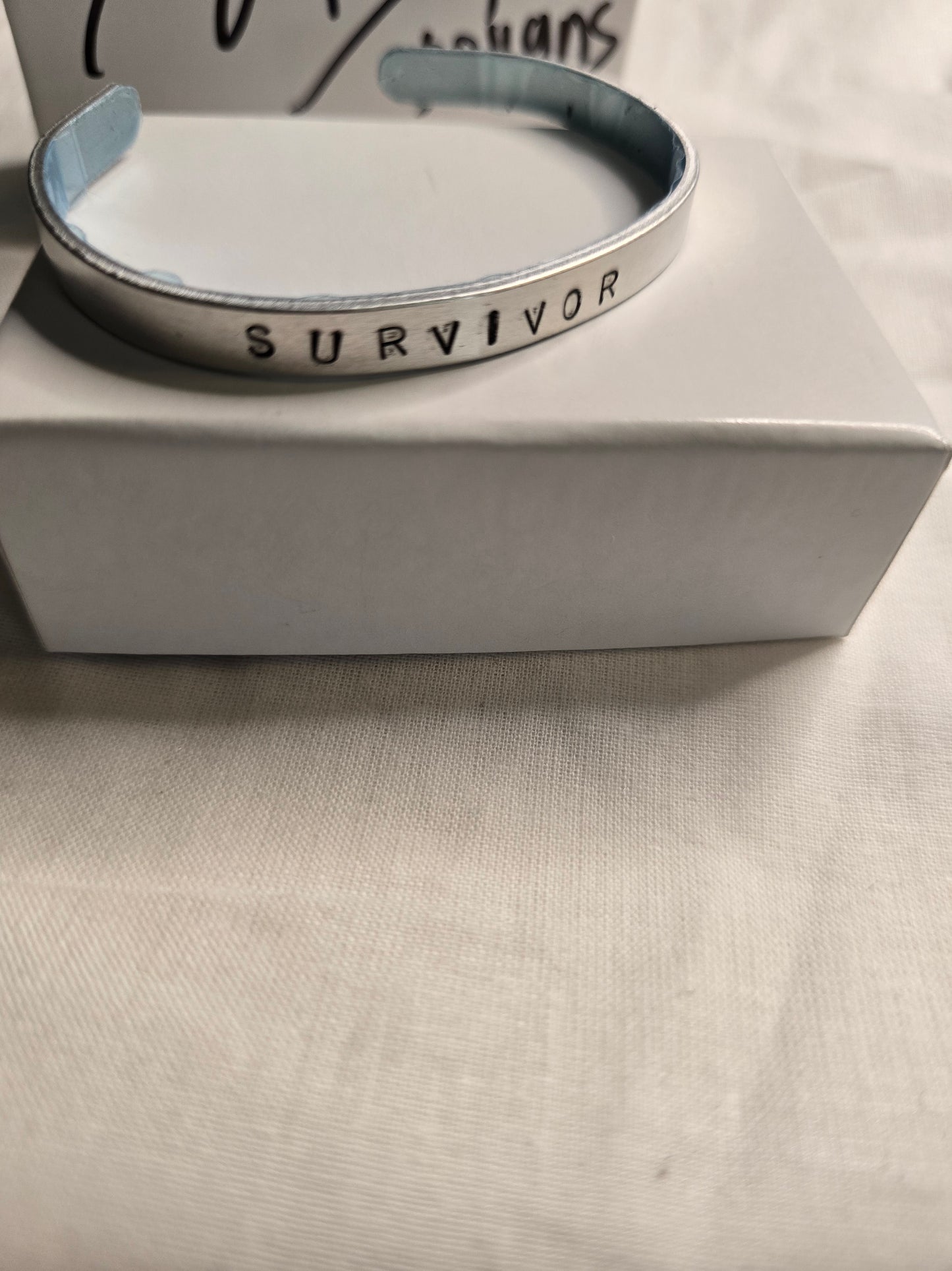 Survivor metal bracelet