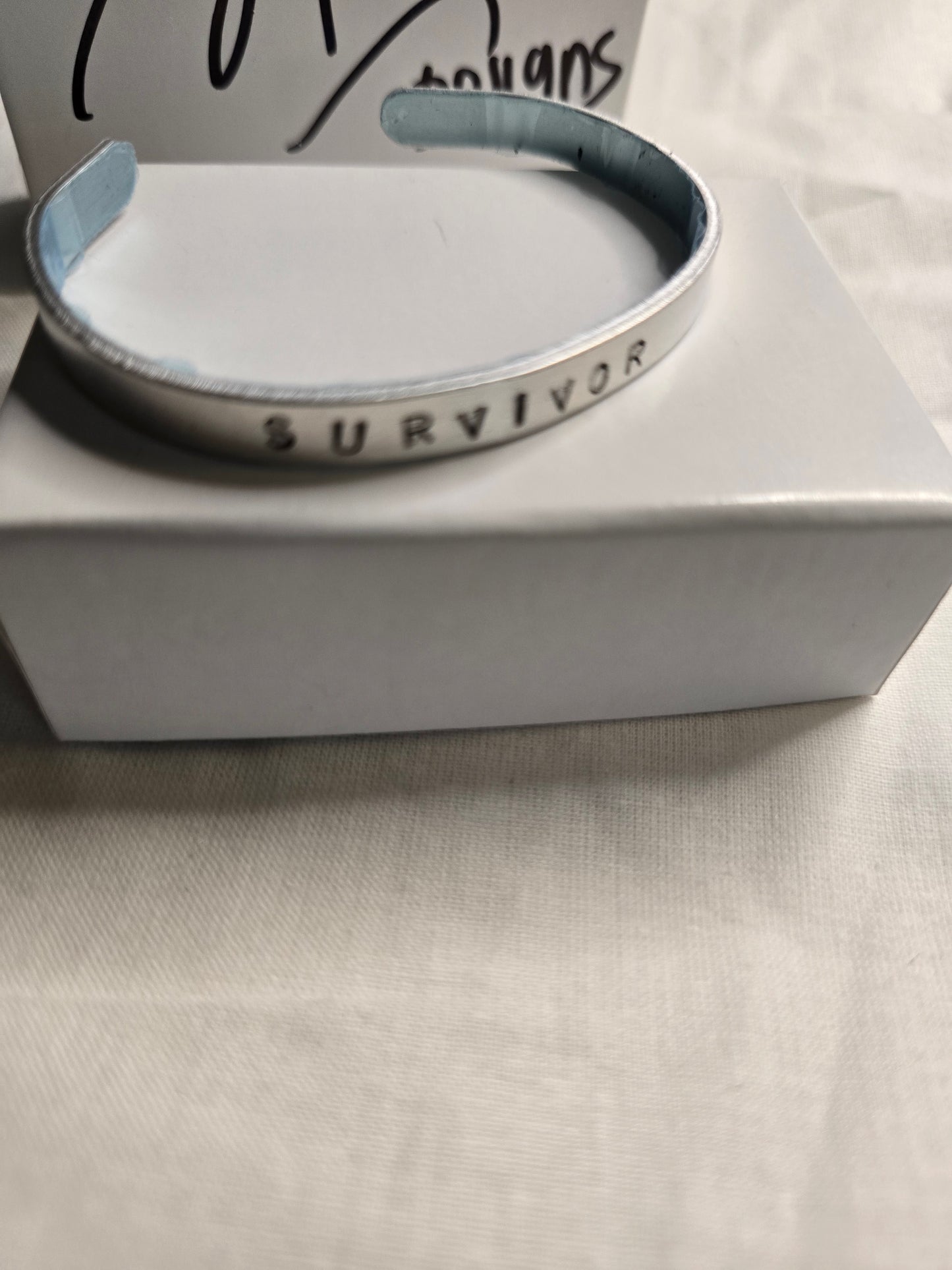 Survivor metal bracelet