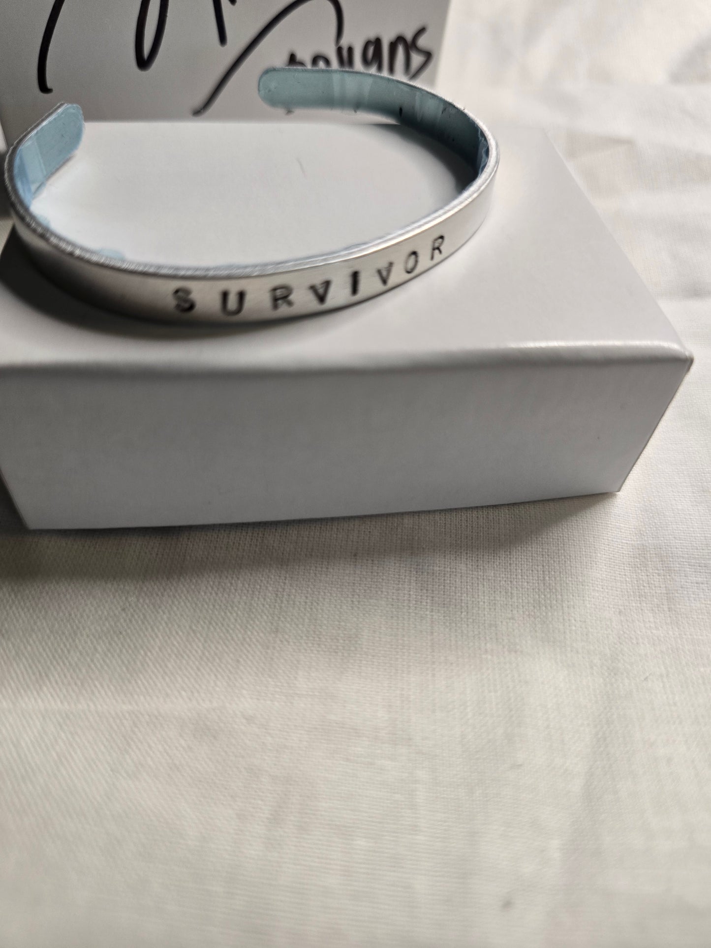 Survivor metal bracelet