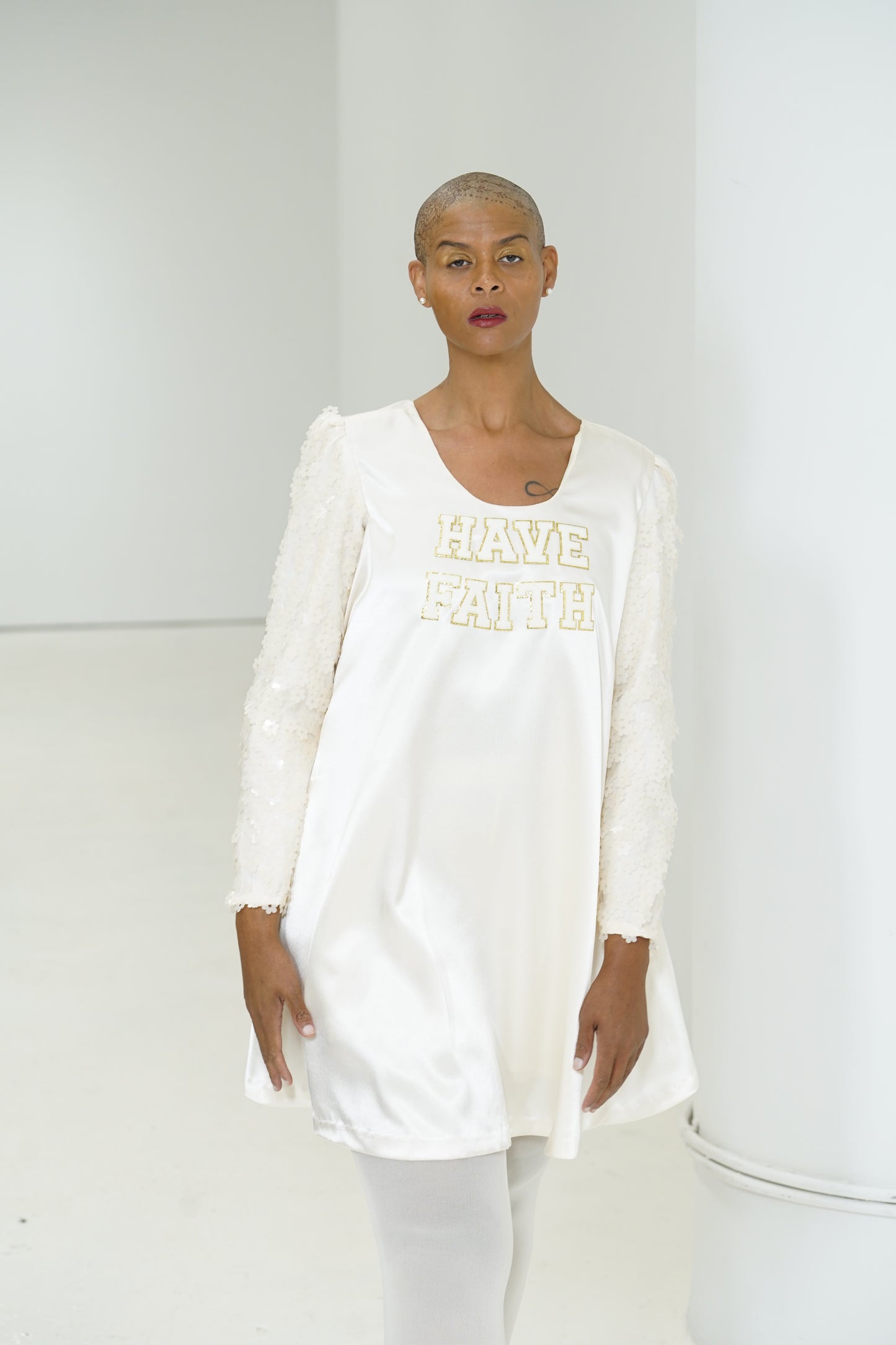 Have Faith tunic with textured sleeves