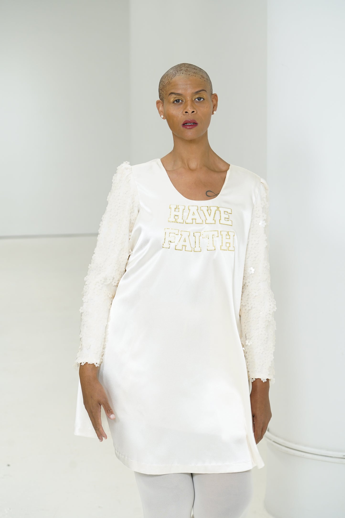 Have Faith tunic with textured sleeves
