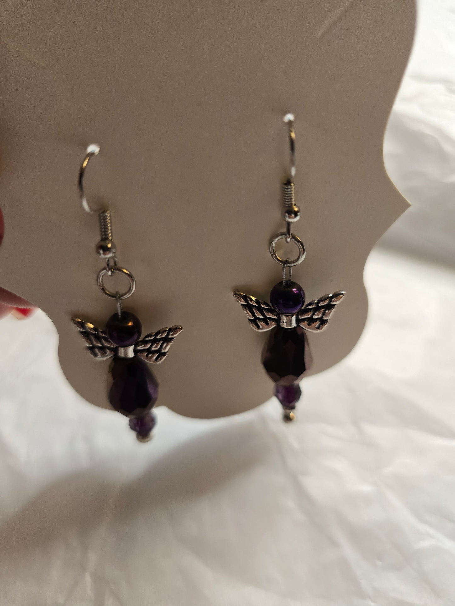 Purple angel design earrings