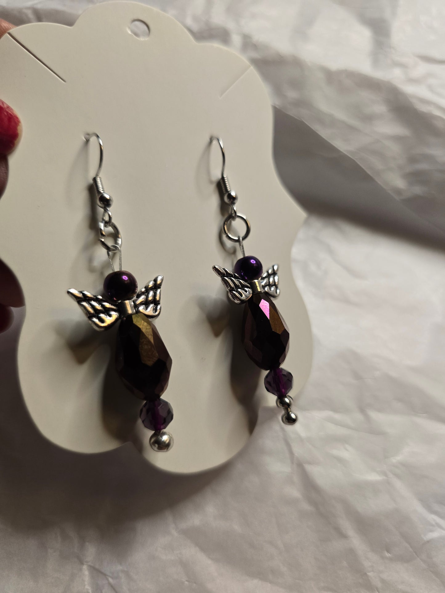 Purple angel design earrings