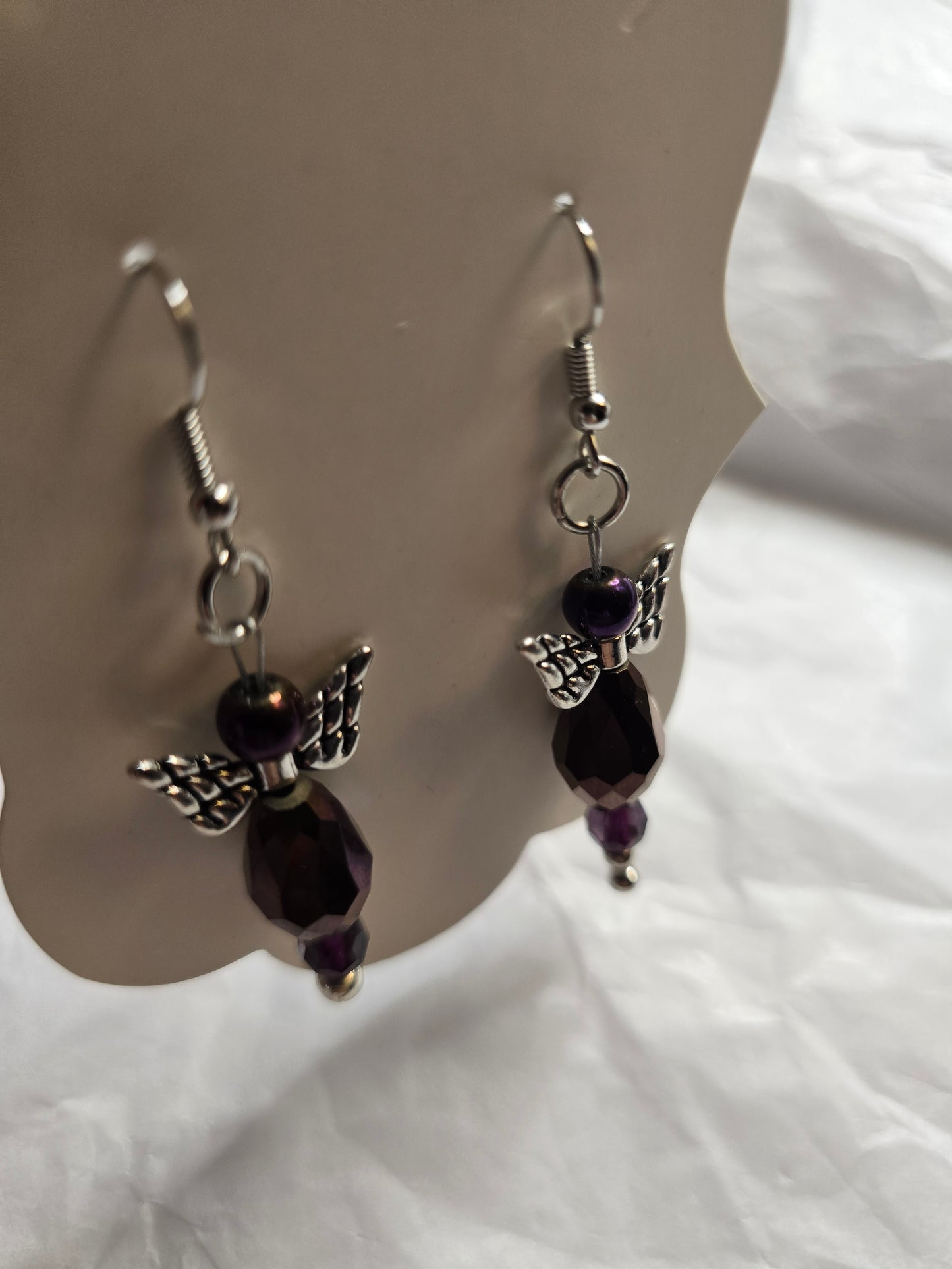 Purple angel design earrings