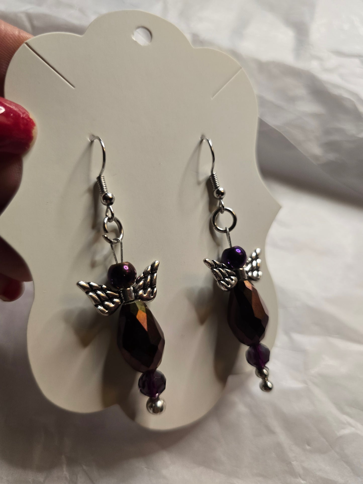 Purple angel design earrings