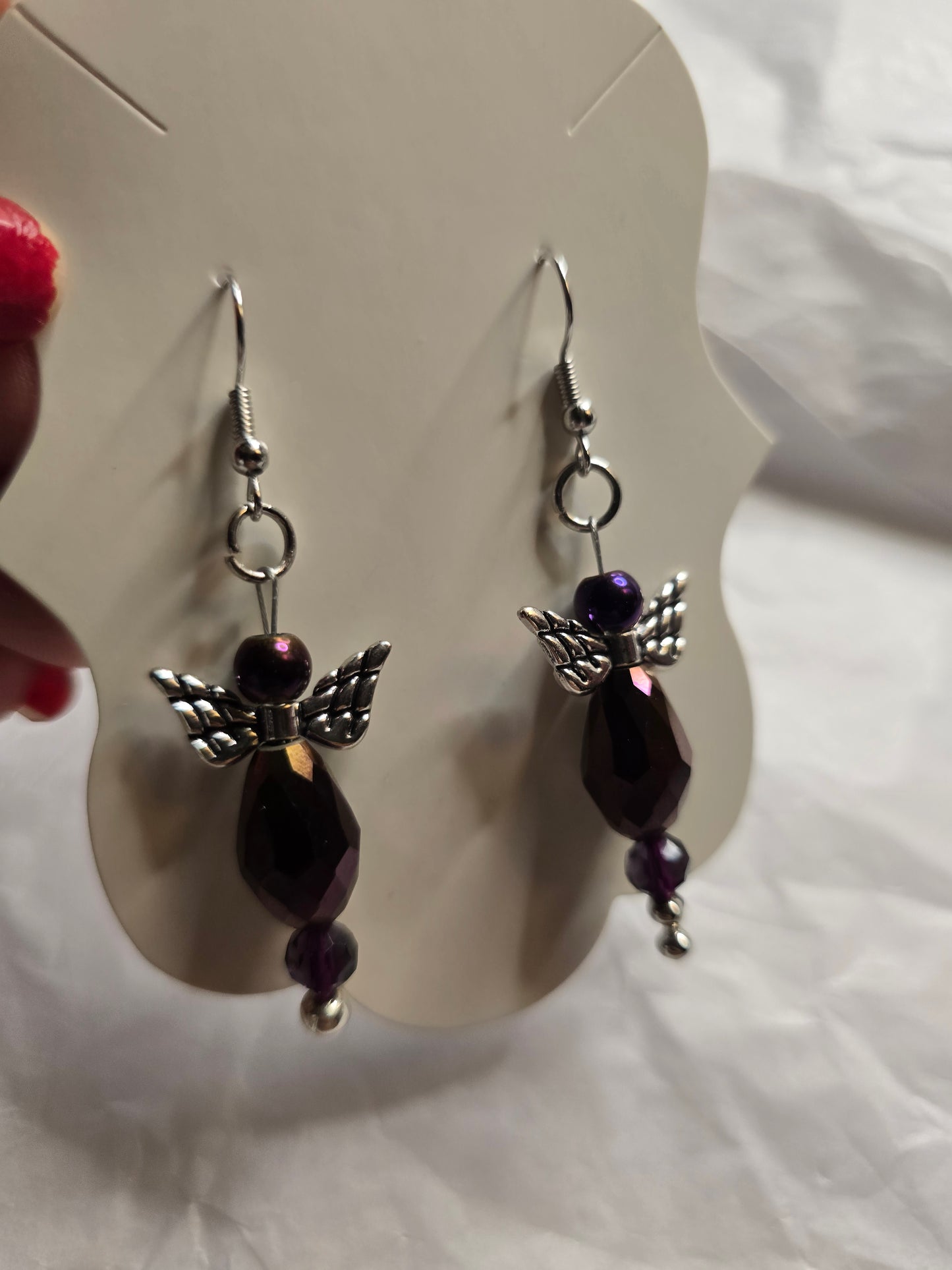 Purple angel design earrings
