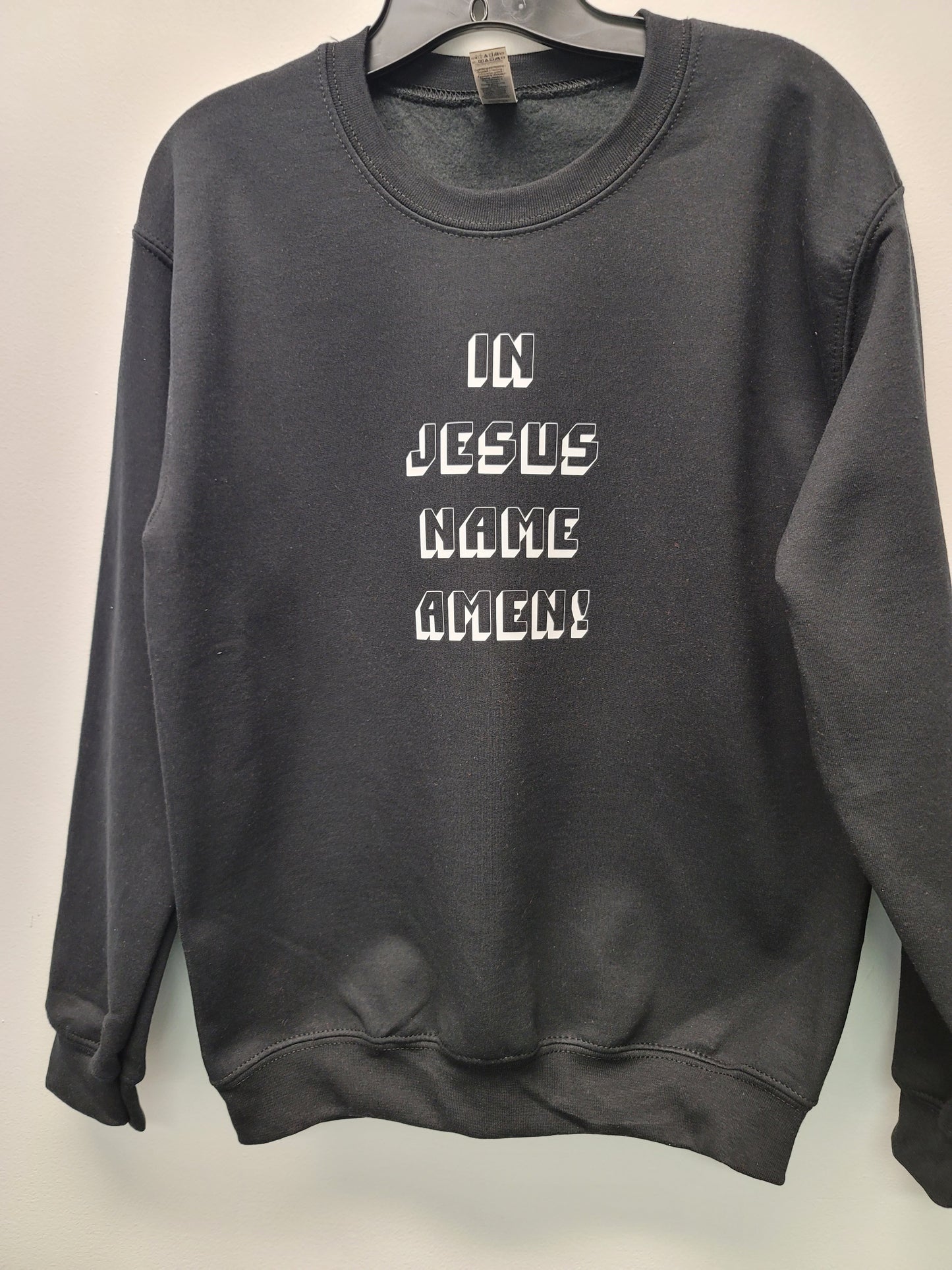 In Jesus name crew neck sweater with block letters