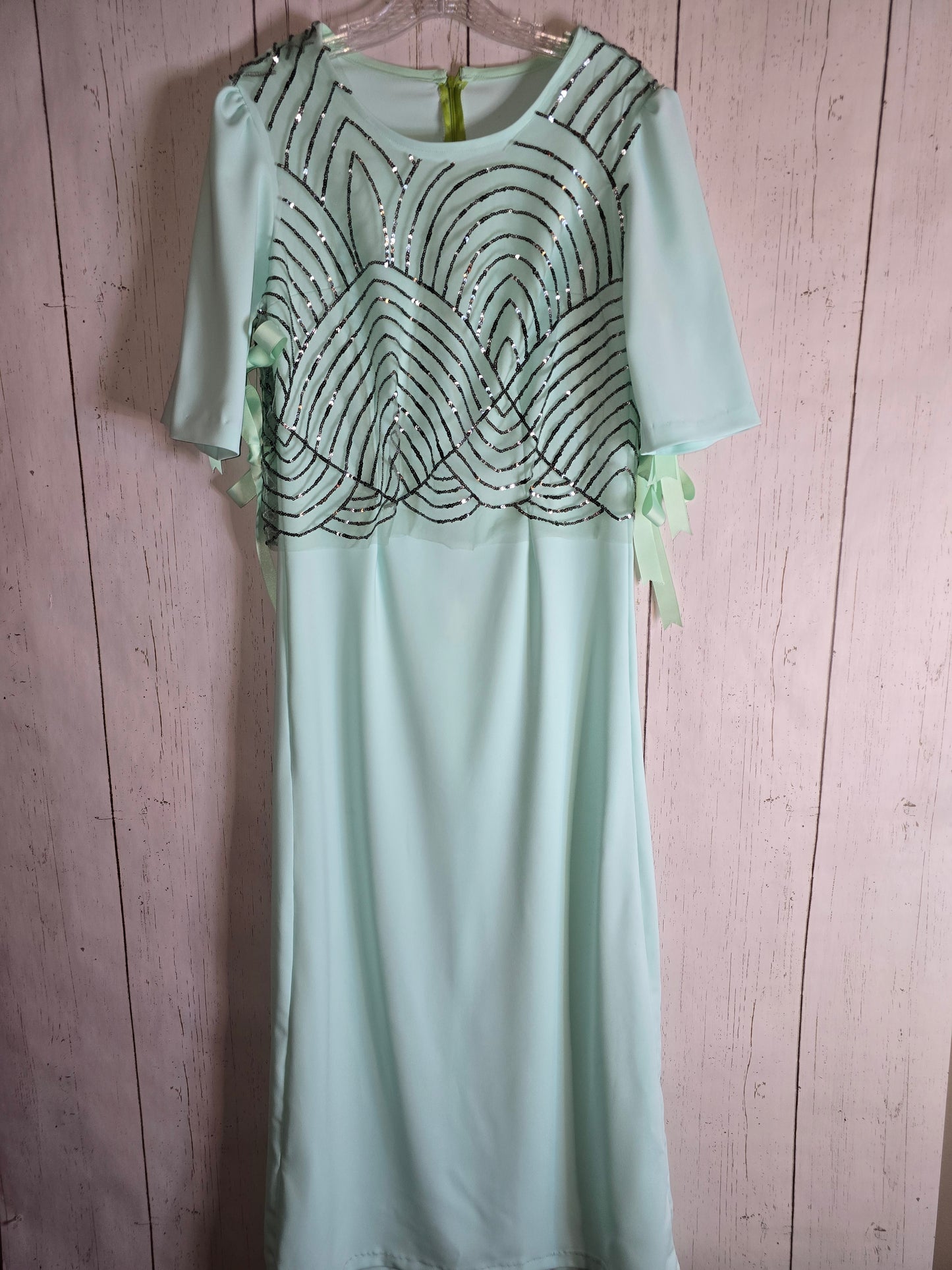 Elegant long green light green dress with 3/4 sleeves made for JulissaDesigns Collection